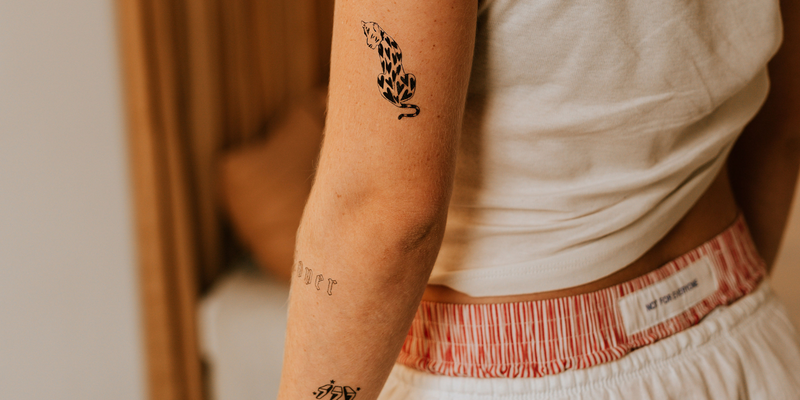 Upper arm tattoos